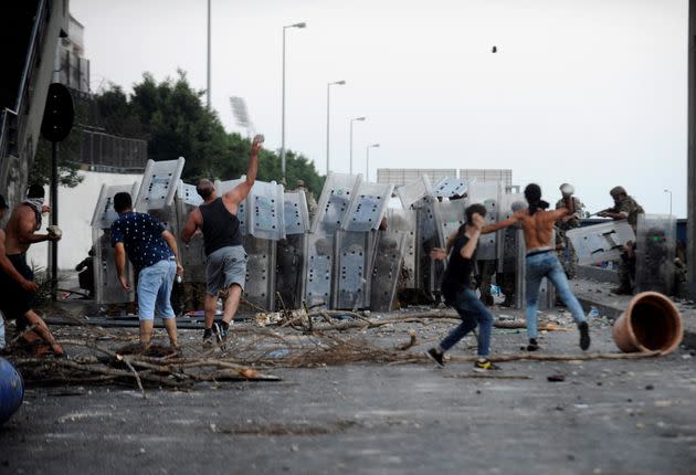 Protestors throw stones at Lebanese army members in Beirut in July this year as demonstrations continue (Photo: Xinhua News Agency via Xinhua News Agency via Getty Ima)