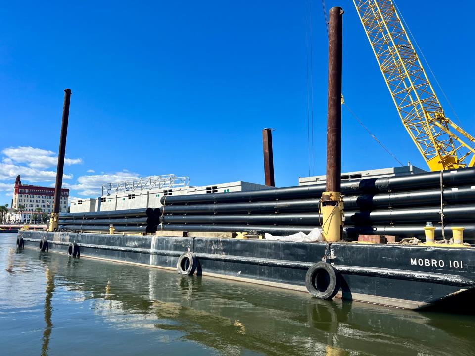 Dock improvements include replacing 29 concrete pilings with steel pilings, larger wood walers, concrete modular floats, and the installation of new water and electrical utilities.