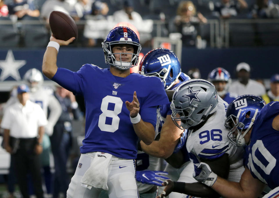 New York Giants quarterback Daniel Jones (8) throws a pass under pressure from Dallas Cowboys defensive tackle Maliek Collins (96) in the second half of a NFL football game in Arlington, Texas, Sunday, Sept. 8, 2019. (AP Photo/Michael Ainsworth)