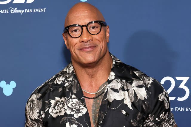 <p>Rodin Eckenroth/Getty </p> Dwayne Johnson at 2024 D23 Expo in Anaheim, Calif