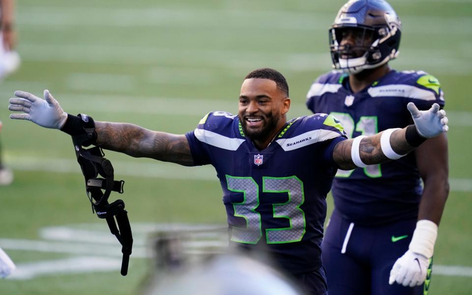 Seattle Seahawks strong safety Jamal Adams (33) celebrates after the Seahawks beat the Dallas Cowboys 38-31 in an NFL football game, Sunday, Sept. 27, 2020, in Seattle. - AP