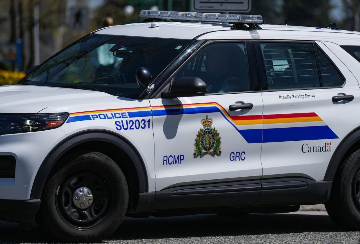 A Surrey RCMP vehicle is pictured in this file photo from April 2023. Surrey Mayor Brenda Locke and the Surrey Board of Trade are complaining about the number of dangerous sex offenders living in the city.  (Darryl Dyck/The Canadian Press - image credit)