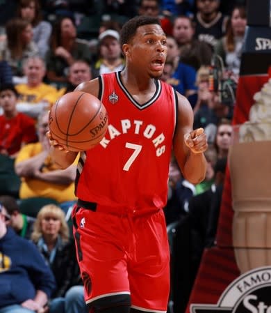 Toronto Raptors guard Kyle Lowry (7) brings the ball up court against the Indiana Pacers at Bankers Life Fieldhouse. Toronto defeats Indiana 101-94 in overtime. Mandatory Credit: Brian Spurlock-USA TODAY Sports