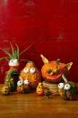 <p>For this motley crew, bumpy, odd-shaped gourds take center stage. To make eyeballs, cut small Styrofoam balls in half, then hot-glue hard candy in the center; attach with pins or hot glue. Hollow out gourds for ears. Use twigs for teeth and legs.</p><p><a class="link " href="https://www.amazon.com/Polystyrene-Styrofoam-Household-Christmas-Decorations/dp/B07VFDWH3Z?tag=syn-yahoo-20&ascsubtag=%5Bartid%7C10070.g.331%5Bsrc%7Cyahoo-us" rel="nofollow noopener" target="_blank" data-ylk="slk:SHOP STYROFOAM BALLS;elm:context_link;itc:0;sec:content-canvas">SHOP STYROFOAM BALLS</a></p>