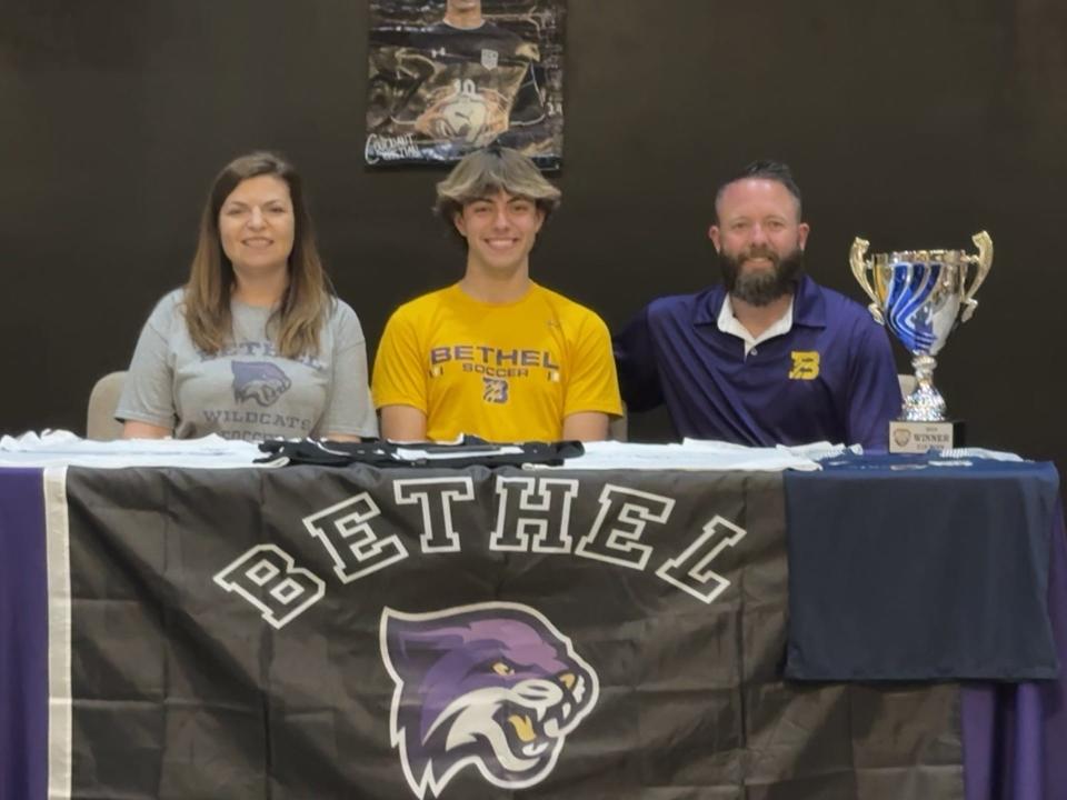 CCA's Connor Bascle with his parents Joni and Matt. Matt is also an assistant soccer coach at Covenant Christian.