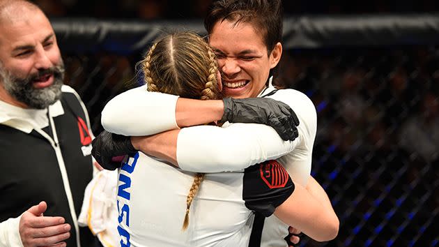 Ansaroff and Nunes embrace. Image: Getty