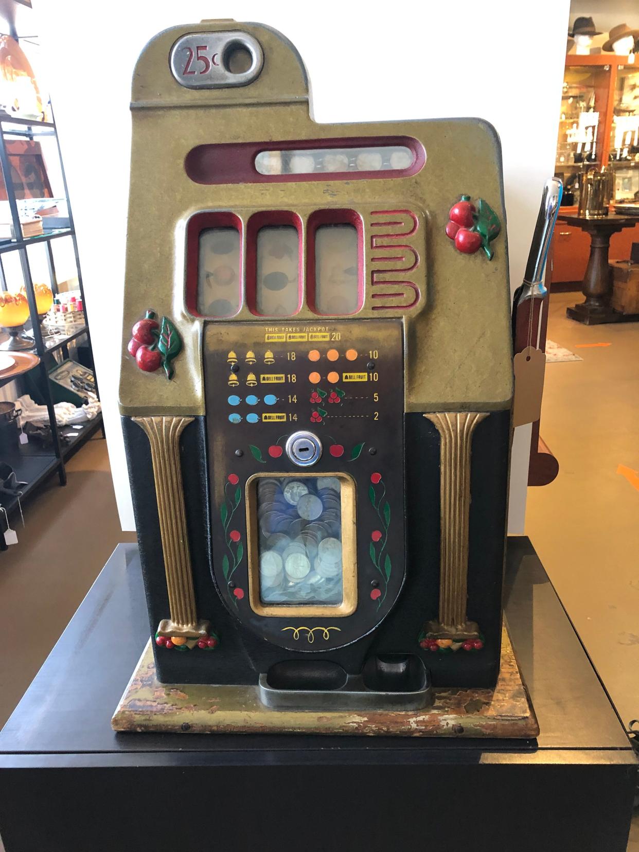 Old mechanical slot machines like this 1947 Mills ($3500) are catnip to collectors.