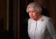 <p>Queen Elizabeth II prepares to greet Kazakhstan President Nursultan Nazarbayev at Buckingham Palace in November 2015.</p>