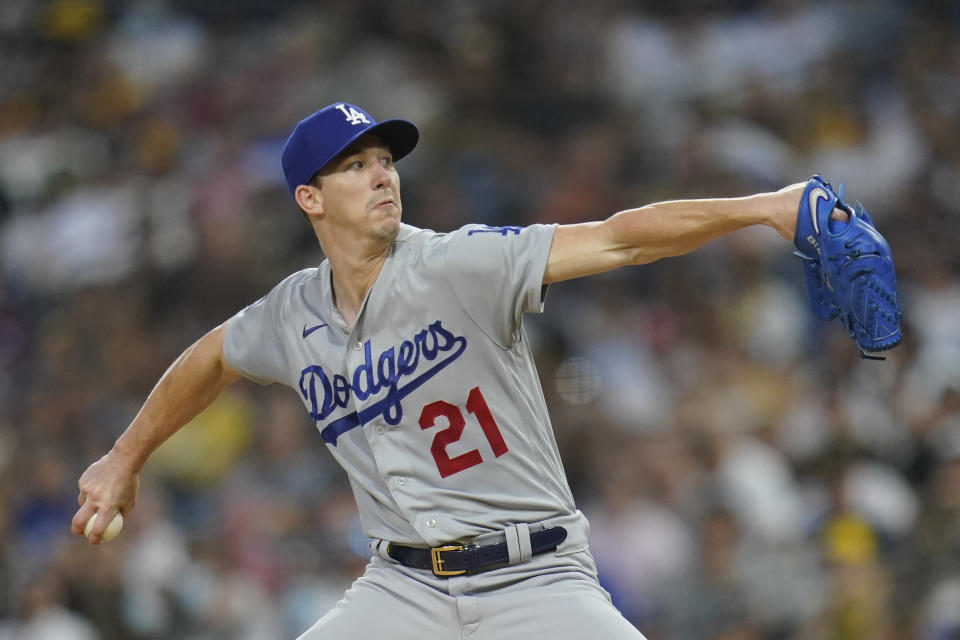 Los Angeles Dodgers starting pitcher Walker Buehler works against a San Diego Padres batter during the first inning of a baseball game Wednesday, Aug. 25, 2021, in San Diego. (AP Photo/Gregory Bull)