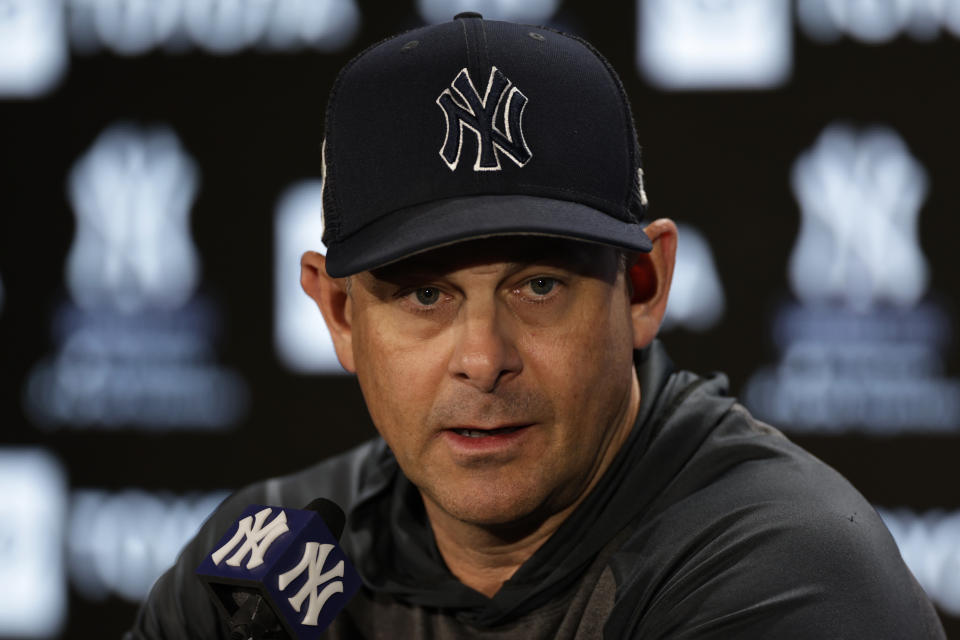 New York Yankees manager Aaron Boone speaks to reporters on Thursday, April 7, 2022, in New York. The Yankees will face the Boston Red Sox in a baseball game on Friday. (AP Photo/Adam Hunger)