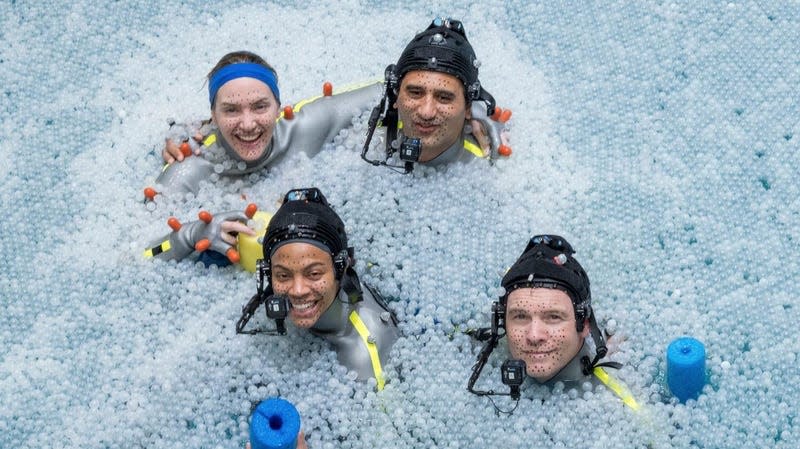 The four human leads of The Way of Water, doing performance capture in the water.