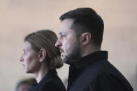 President of Ukraine Volodymyr Zelenskyy and his wife Olena Zelenska attend the funeral of Leonid Kravchuk, independent Ukraine's first president, at the International Convention Center Ukrainian House, in Kyiv, Ukraine, Tuesday, May 17, 2022. Kravchuk led Ukraine to independence amid the collapse of the Soviet Union and served as its first president. He died on May 10 at the age of 88. (AP Photo/Evgeniy Maloletka)