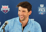 Michael Phelps speaks to the media after practice, Wednesday, April 23, 2014, in Mesa, Ariz. Phelps is competing in the Arena Grand Prix at Mesa on Thursday as he returns to competitive swimming after a nearly two-year retirement. (AP Photo/Matt York)