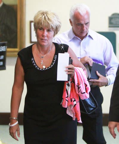 <p>Joe Burbank/Orlando Sentinel/Tribune News Service/Getty</p> George and Cindy Anthony arrive at the Orange County Courthouse for their daughter's first-degree murder trial, in Orlando, Florida on May 24, 2011.