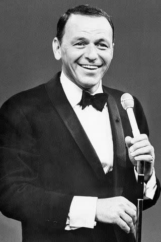 <p>Bettmann Archive</p> Frank Sinatra performs on his TV special "Frank Sinatra: A Man and his Music."