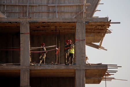 Israeli forces prepare to demolish a Palestinian building on the outskirts of Jerusalem