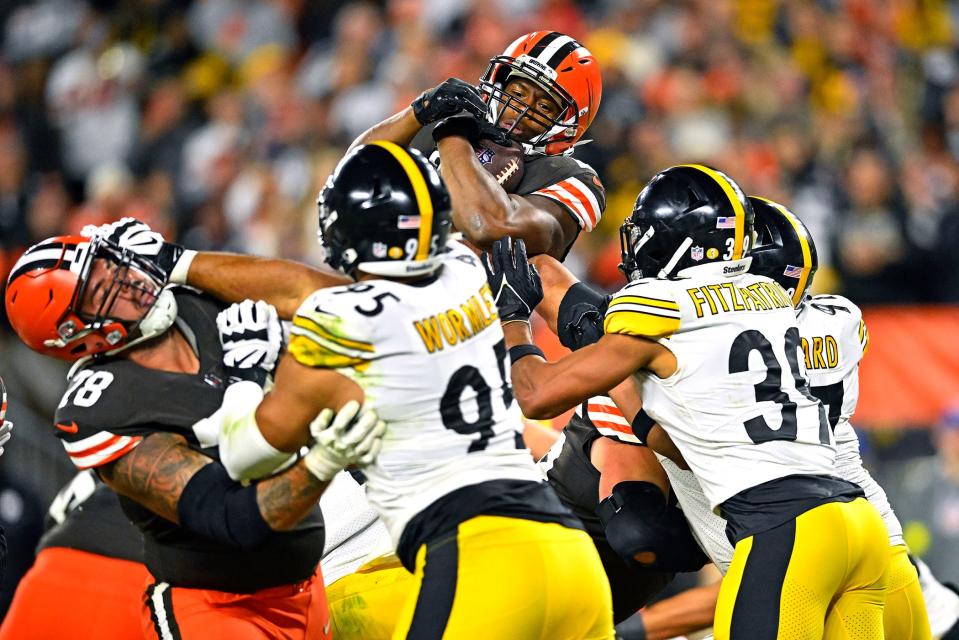 Browns running back Nick Chubb leaps into the end zone for a second-half touchdown against the Pittsburgh Steelers in Cleveland, Thursday, Sept. 22, 2022.