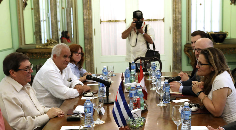 Cuba's Foreign Minister Bruno Rodriguez, left, and Canada's Foreign Minister Chrystia Freeland, right, meet in Havana, Cuba, May 16, 2019. Freeland's office says the purpose of the visit is "to discuss the deteriorating situation" in Cuba's ally Venezuela, as well as tightened U.S. sanctions on Cuba. (Alexandre Meneghini/Pool Photo via AP)