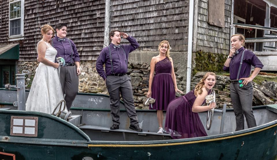 This is, by far, my favorite photo from the whole wedding day because it&nbsp;<i>perfectly</i> sums up everyone in the photo. My now-wife has been saying since we first started dating that once we got married, she was going to take my last name (Morgan). That way, once we were married, she could make everyone call her Captain Morgan. Our wedding venue had this boat for photo-ops, and we took full advantage. The looks on our bridesmates' (see what we did there?) faces as my stepdaughter steers the boat out of control sums up their personalities perfectly. This photo cracks me up every time I see it. Our daily life is just like this photo and I love it. -- <i>Riley M.</i>