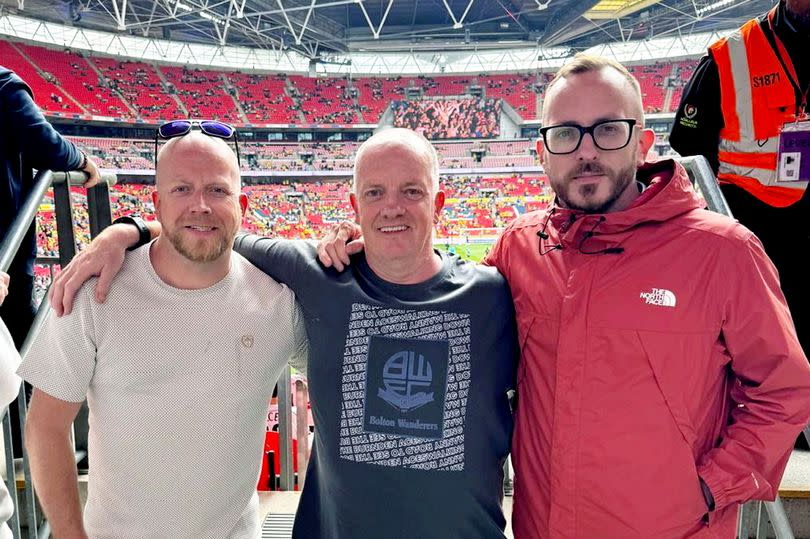 Andy Bebbington (right) with his dad and brother at Wembley -Credit:Andy Bebbington / SWNS