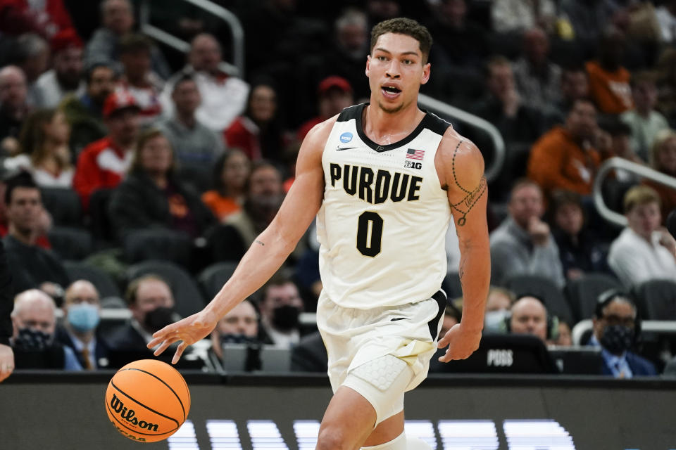 FILE - Purdue's Mason Gillis dribbles the ball during the second half of the team's first-round NCAA college basketball tournament game against Yale, March 18, 2022, in Milwaukee. Gillis has 48 career starts and guard Brandon Newman made 23 starts two years ago and hopes to play more that way this season. (AP Photo/Morry Gash, file)