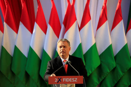 Hungarian Prime Minister Viktor Orban speaks during a campaign closing rally in Szekesfehervar, Hungary, April 6, 2018. REUTERS/Bernadett Szabo