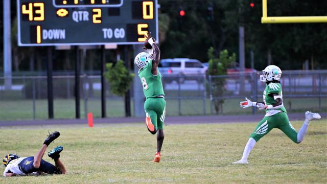 PHOTOS: Cardinal Newman vs. Pahokee football season opener