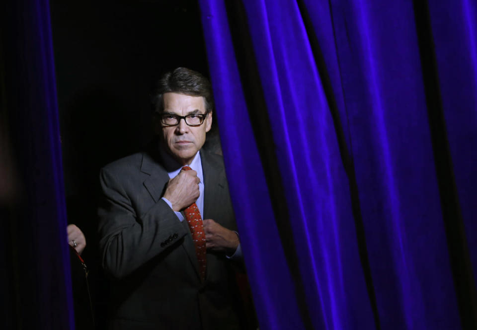 Jan. 24, 2015 — Rick Perry prepares to speak at Freedom Summit