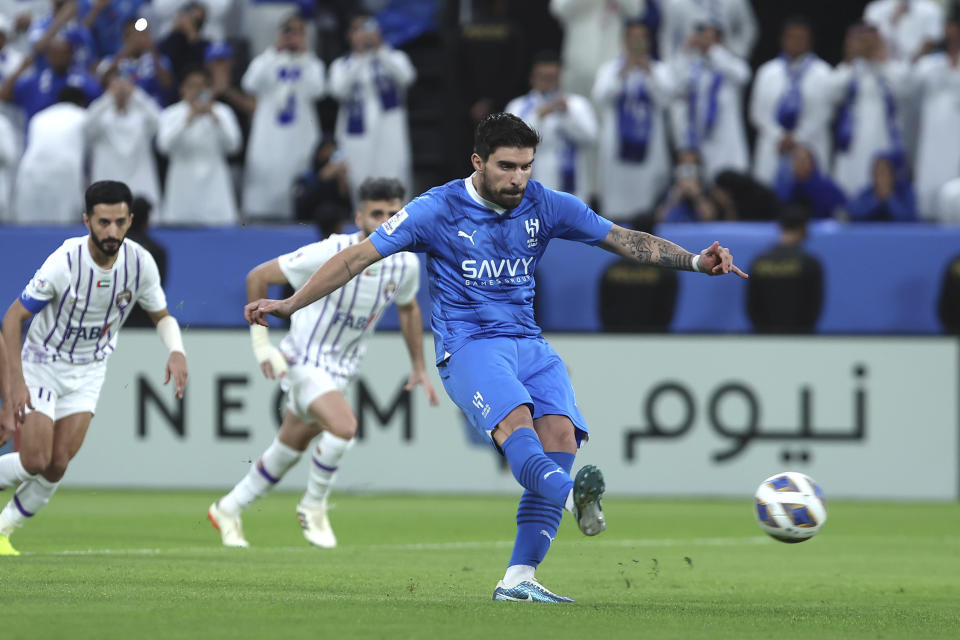 Saudi Arabia's Al Hilal's Ruben Neves, shoots the ball during his team soccer match with UAE's Al Ain in the second leg of their AFC Champions League 2023/24 semi-final at Kingdom Arena Stadium in Riyadh, Saudi Arabia, Tuesday, April 23, 2024. (AP Photo)