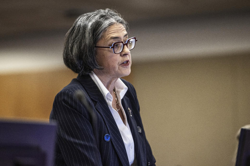 Prosecutor Kristy McDonald addresses a court in Auckland, New Zealand, on Tuesday, July 11, 2023, on the first day of a trial after a volcano eruption at a popular tourist island destination killed 22 people in December 2019. The island's owners, brothers Andrew, James and Peter Buttle, their company Whakaari Management Ltd. and tour operators I.D. Tours NZ Ltd. and Tauranga Tourism Services Ltd. went on trial in Auckland District Court for allegedly failing to adequately protect tourists and staff. (Lawrence Smith/Pool Photo via AP)