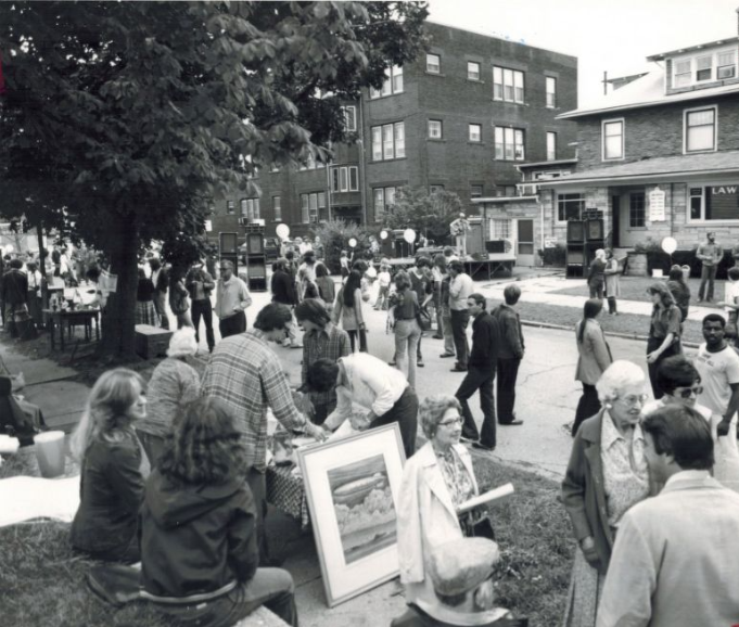 A street fair is held at Highland Square in 1978. The event, sponsored by the Highland Square Community Council, included music, baked goods, art and face painting.