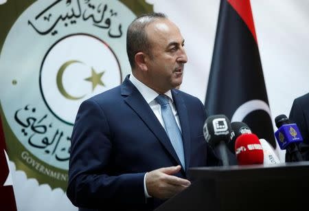 Turkey's Foreign Minister Mevlut Cavusoglu speaks during a joint news conference with Mohammed Siyala, foreign minister in Libya's new U.N.-backed national unity government, in Tripoli, Libya, May 30, 2016. REUTERS/Ismail Zitouny