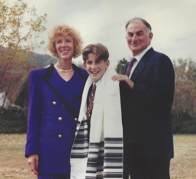 The author is pictured with his parents at his own bar mitzvah.