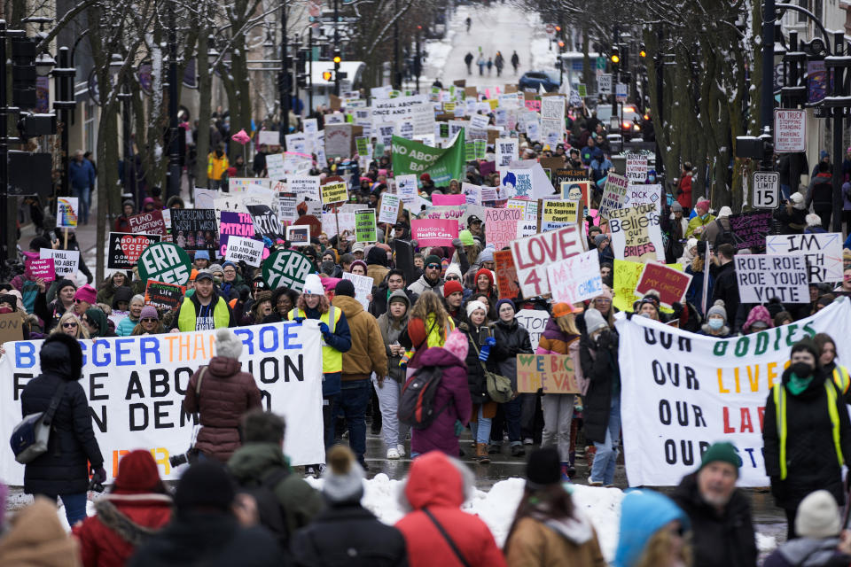 Protesters make their way to the Wisconsin Capitol Rotunda during a march supporting overturning Wisconsin's near total ban on abortion Sunday, Jan. 22, 2023, in Madison, Wis. (AP Photo/Morry Gash)