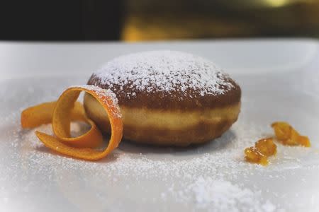 A "paczki" donut is shown at Delightful Pastries in Chicago, Illinois in this March 11, 2013 handout photo provided by Barbara Gasior Photography on February 3, 2016. REUTERS/Barbara Gasior Photography/Handout via Reuters