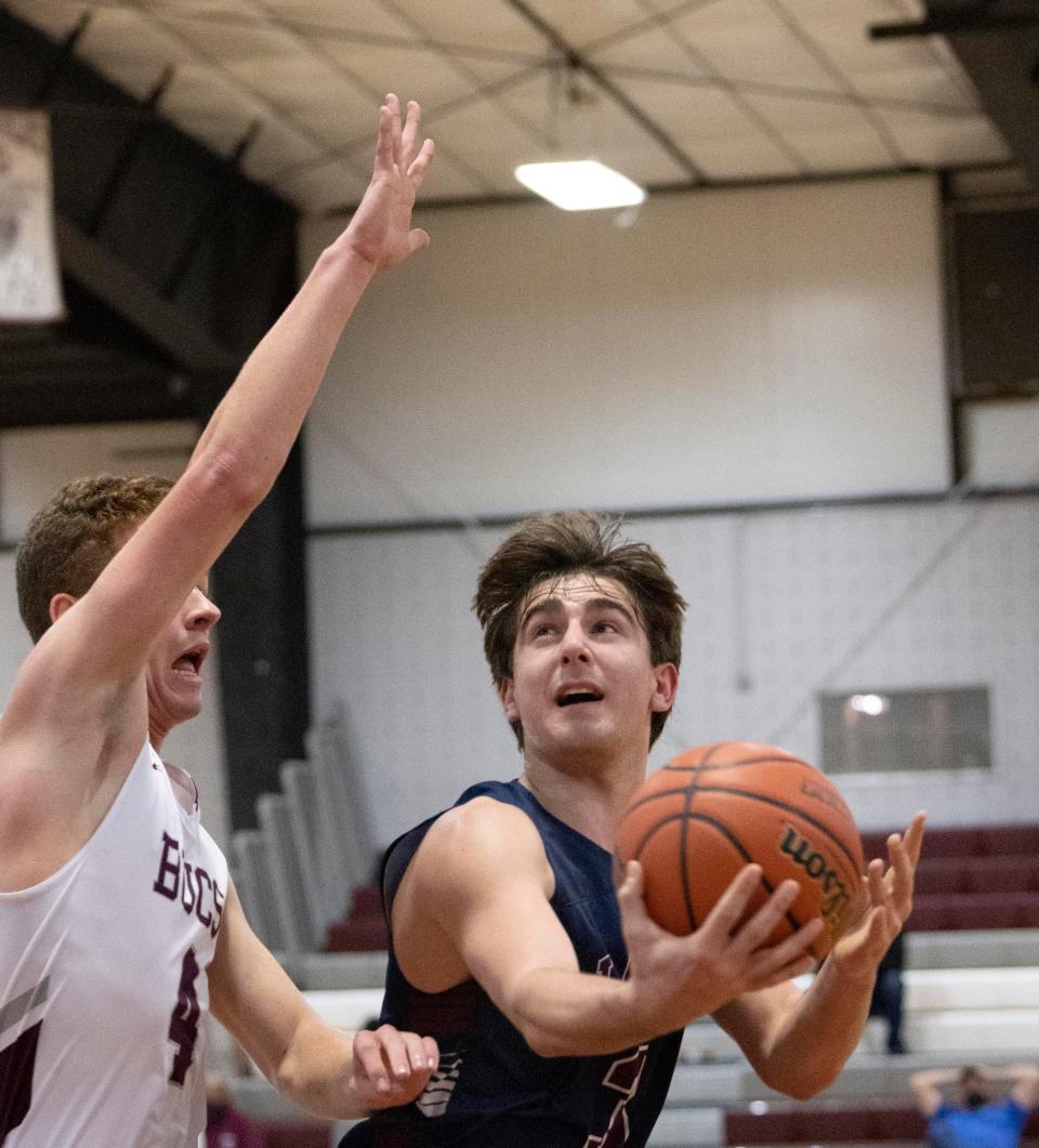 Lacey Troy Buxton looks for an opening to shoot as he's guarded by Red Bank Tommy Keegan. Lacey Boys Basketball vs Red Bank in Albert E. Martin But Holiday Classic in Red Bank, NJ on December 28, 2021.