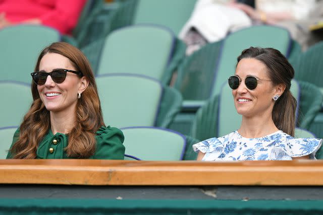 <p>Karwai Tang/Getty</p> Catherine, Duchess of Cambridge and Pippa Middleton in the Royal Box on Centre Court during day twelve of the Wimbledon Tennis Championships on July 13, 2019 in London, England.