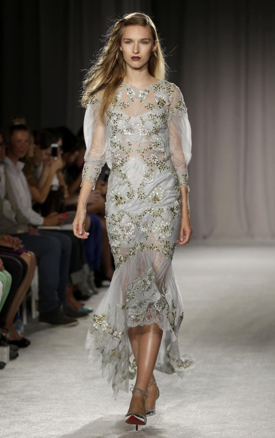 The Marchesa Spring 2014 collection is modeled during Fashion Week in New York, Wednesday, Sept. 11, 2013. (AP Photo/Seth Wenig)