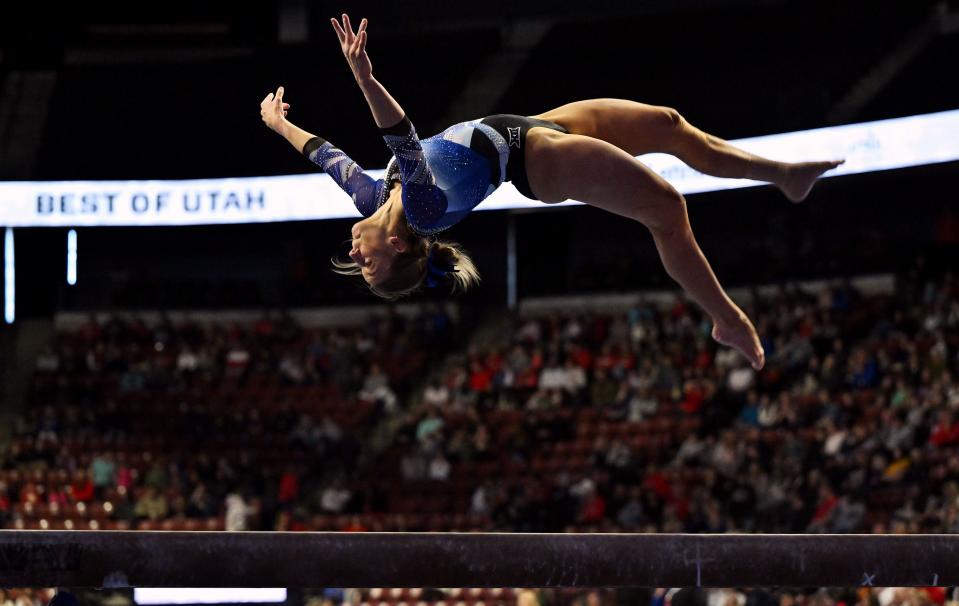 BYU’s Allix Mason, performs on the beam as BYU, Utah, SUU and Utah State meet in the Rio Tinto Best of Utah Gymnastics competition at the Maverick Center in West Valley City on Monday, Jan. 15, 2024. | Scott G Winterton, Deseret News