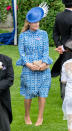 <p>Autumn Phillips pulled out all the stops for the day, showing up in a patterned, long-sleeved blue dress and a feathered fascinator. Photo: Getty Images </p>