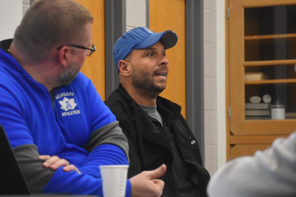 Adrian City Commissioner Allen Heldt, right, speaks during a seminar Friday at Adrian High School titled "So You Want to Run for City Commission?" The program was attended by nearly 30 people who were interested in Adrian's city government. Bob Behnke, left, an organizer of the seminar and retired Adrian Public Schools superintendent, listens.