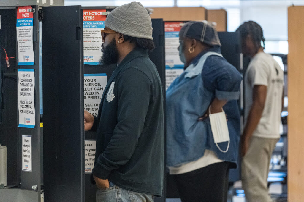 Black voters at a polling station