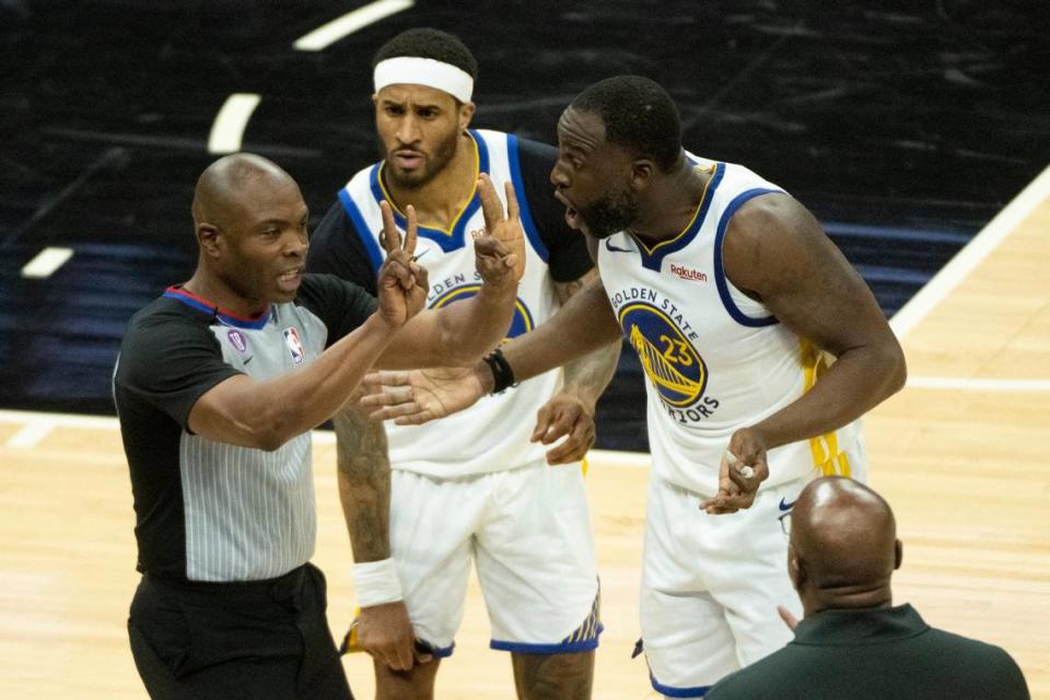 Golden State Warriors forward Draymond Green (23) argues with official after fouling Sacramento Kings center Domantas Sabonis (10) during Game 2 of the first-round NBA playoff series at Golden 1 Center on Monday, April 17, 2023.