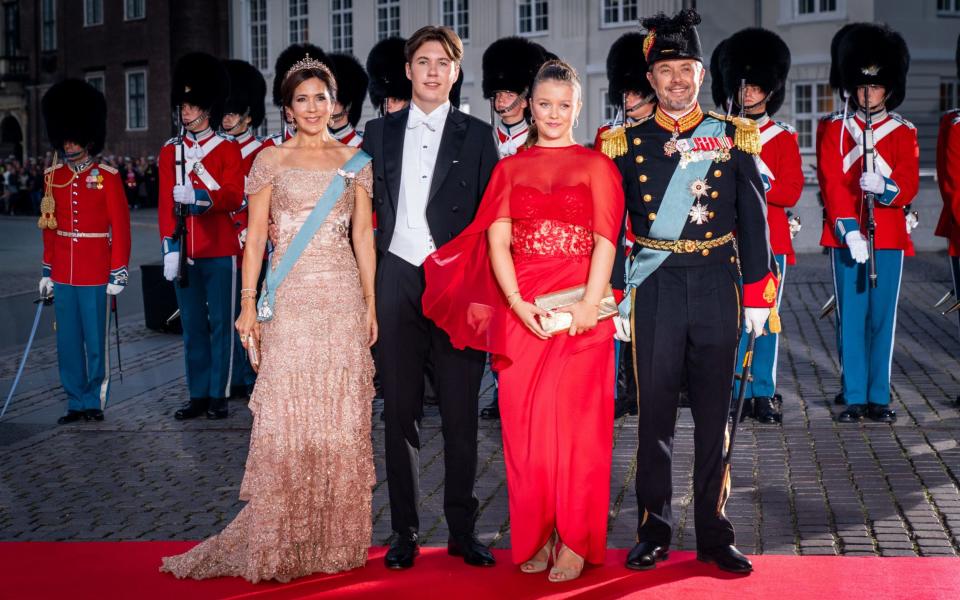 Crown Prince Frederik and Crown Princess Mary with two of their children, including Prince Christian, 18, and Princess Isabella, 16