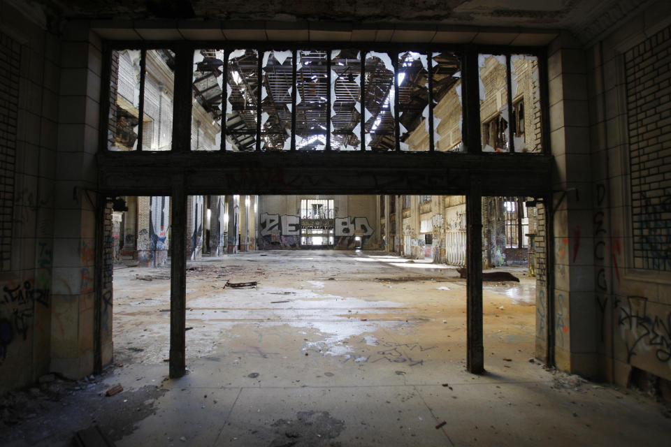 FILE- The interior of the Michigan Central Station is seen, Thursday, Jan. 21, 2010 in Detroit. A once hulking scavenger-ravaged monolith that symbolized Detroit's decline reopens this week after a massive six-year multimillion dollar renovation by Ford Motor Co., which restored the Michigan Central Station to its past grandeur with a focus squarely on the future of mobility. (AP Photo/Carlos Osorio_File)