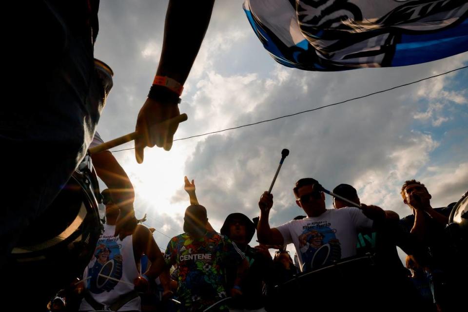 Charlotte FC fans march along Stadium View Drive on their way to the match between Charlotte FC and Columbus Crew at Bank of America Stadium in Charlotte, N.C., Saturday, July 30, 2022.