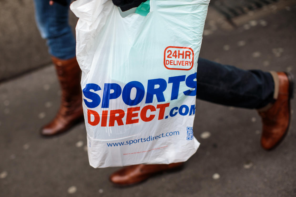 LONDON, ENGLAND - DECEMBER 27: A plastic Sports Direct bag is carried by a shopper on December 27, 2018 in London, England. England’s current 5-pence fee for plastic shopping bags could double in 2020, under plans announced by Environment Secretary Michael Gove. The levy would also apply to smaller retailers currently exempted from the law. (Photo by Jack Taylor/Getty Images)