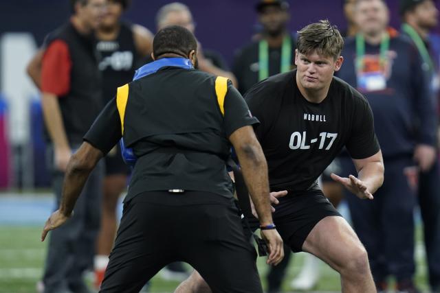 BYU offensive lineman Blake Freeland runs a drill at the NFL football scouting combine in Indianapolis, Sunday, March 5, 2023. | Erin Hooley, Associated Press