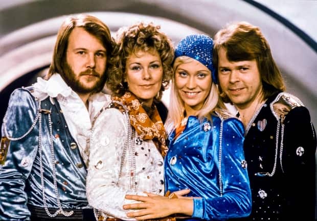The band Abba, from left, Benny Andersson, Anni-Frid Lyngstad, Agnetha Fältskog and Björn Ulvaeus, seen in Stockholm in 1974, announced a new album and virtual concert Thursday.  (Olle Lindeborg/AFP/Getty Images - image credit)