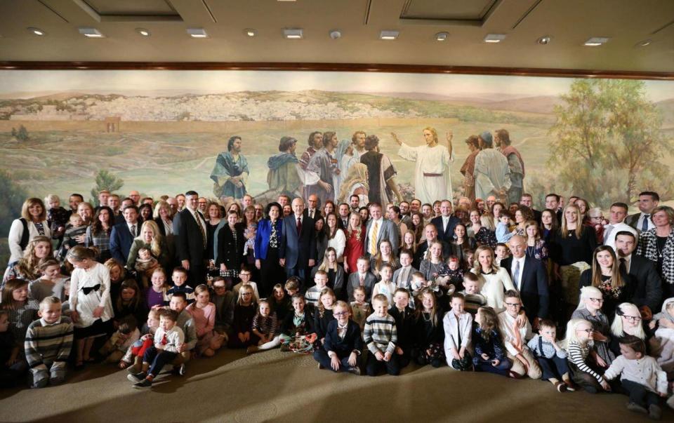 Russell M Nelson, the new president of the Mormon church, has his picture taken with family members after a press conference to announce him as 17th president of the church (George Frey/Getty Images)